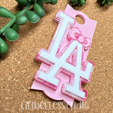 Pink LA bow acrylic topper