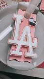 Pink LA bow acrylic topper