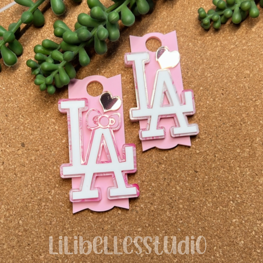 Pink LA bow acrylic topper