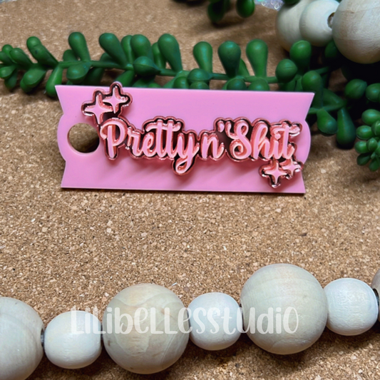 Pretty n’ Shit acrylic topper